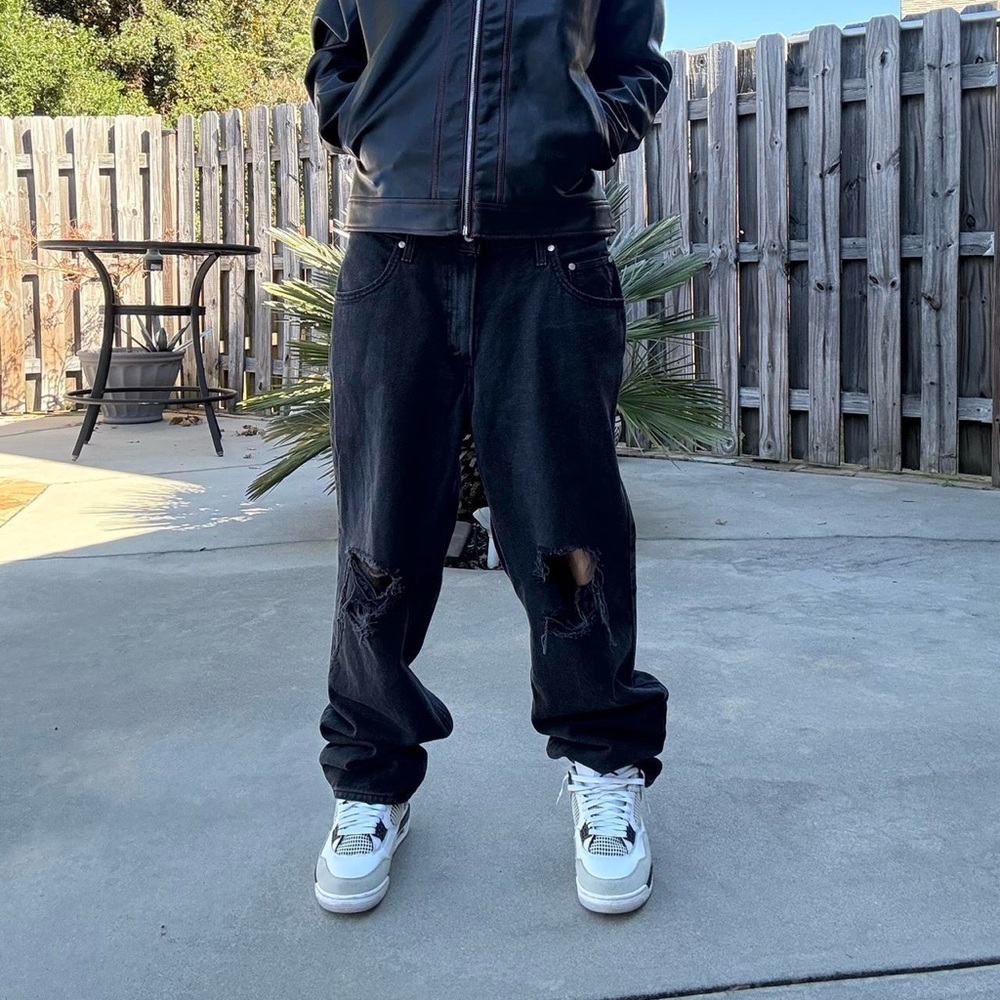 Super cool vintage y2k 2000s black distressed super baggy Levi’s Silver Tabs!